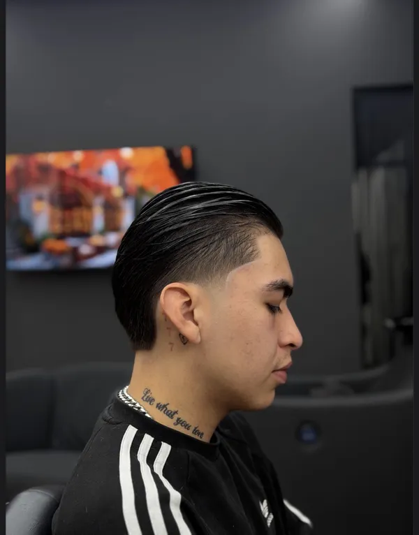 Slick back met lage fade